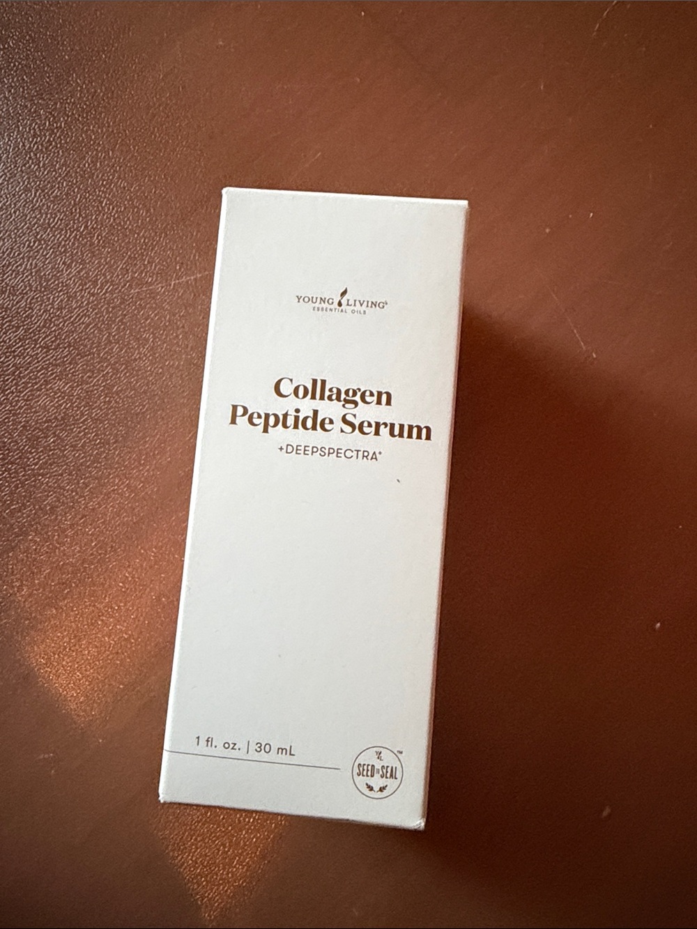 Young Living Collagen Peptide Serum — Cream & Gold Text